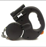 Black dual retractable dog leash with a bone-shaped clip on a white background, designed for smooth, tangle-free walking of two dogs.
