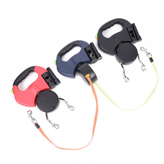 Four dual retractable dog leashes in different colors displayed on a white background, featuring LED lighting and a 360-degree tangle-free design for walking two dogs.