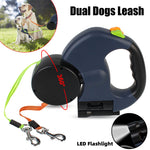 Dual retractable dog leash with built-in LED flashlight and 360-degree swivel design, allowing safe and tangle-free walking for two dogs.