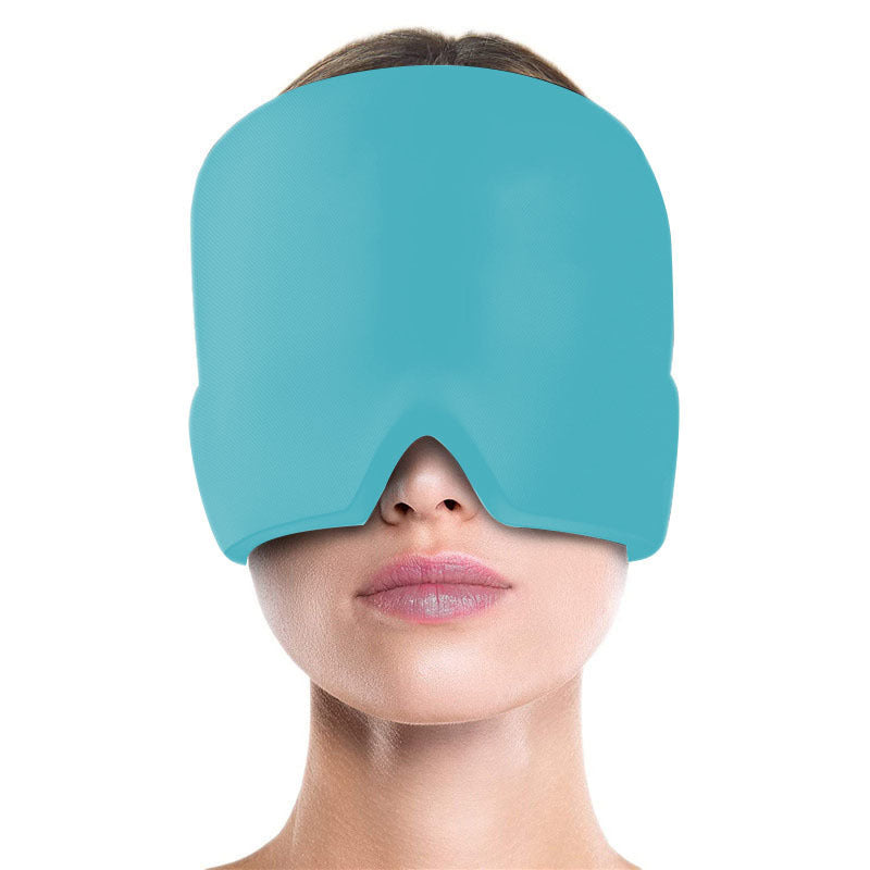 Person wearing a blue sleep mask on a white background