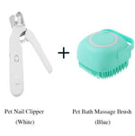 Pet nail clipper and pet bath massage brush on a white background