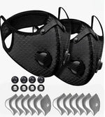 Two black face masks with filter cartridges on a white background